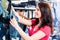 Woman buying jeans in shop