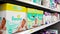 Woman buying Pampers wipes lingttes