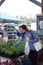 Woman buying produce