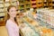 Woman buying selection dried fruit