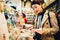 Woman buying souvenirs in handkerchief vendor