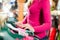 Woman is buying Tracht or dirndl in a shop