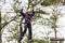 Woman on cables in an adventure park