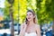 Woman call on phone. Attractive woman using smart phone outdoors. Outdoor portrait of pretty woman speaking on the phone