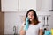 Woman Calling To Plumber For Water Leakage Problem