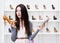 Woman can\'t choose high heeled shoes