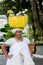 Woman of the candomble religion carrying gifts for Iemanja on her head. City of Cachoeira, Bahia