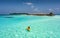 Woman in a canoe in the Maldives