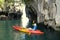 Woman in a canoe paddling