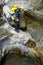 A woman canyoning in Pyrenees, Spain.