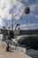 Woman captain tying fishing boat