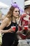 Woman carries drinks at The Virginia Gold Cup