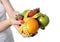 Woman carrying fruit in hands healthy lifestyle