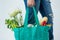 Woman carrying grocery bag