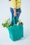 Woman carrying grocery bag