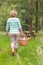 Woman carrying a picnic basket