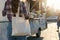 A woman carrying a white tote bag, White blank tote bags mockup