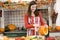 Woman carving jack o lantern on Halloween