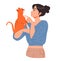 A woman with a cat in her arms. A woman hugs a kitten. Pet owner.