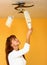 A woman changing light bulb