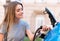 Woman charging battery of eco car