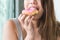 Woman cheating during diet and eating doughnut. selective focus on mouth