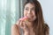 Woman cheating diet and eating doughnut. selective focus on mouth