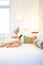 woman checking her phone in the bedroom - social media dependency