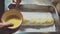 Woman Chef Baking Apple Strudel. Female Hands Applying Egg Wash onto Dough with Basting Brush