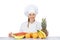 Woman chef over the table with fruits smiling. isoleted