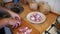 Woman Chef Throws Sliced Meat in a Bowl on the Home Kitchen. Slow Motion