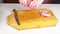 Woman chef throws sliced meat on a cutting board in the home kitchen. Hands Cutting Fresh Meat, Cutting Meat on a