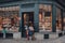 Woman and a child entering a souvenir shop in old town in Brussels, Belgium