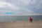 Woman and child having fun with a kite