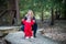 Woman with child in park smiling