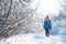 Woman with a child on a winter hike in the mountains