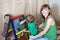 Woman and children draws on blackboard