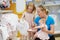 Woman with children in shop