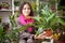 Woman chooses aspidistra