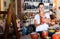 Woman choosing ceramics in pottery store