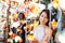 Woman choosing the decoration lamp in street market