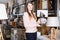 Woman choosing lamp in store