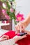 Woman choosing nail polish in beauty parlor