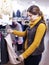 Woman choosing skirt at store