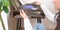 Woman choosing vinyl records at home for listening