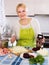 Woman chopping cabbage for soup