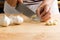 Woman chopping garlic