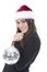 Woman with a christmas hat with a shinny ball