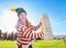 Woman in Christmas tree hat supporting Leaning Tour of Pisa