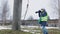 Woman civil engineer using photo camera on construction site